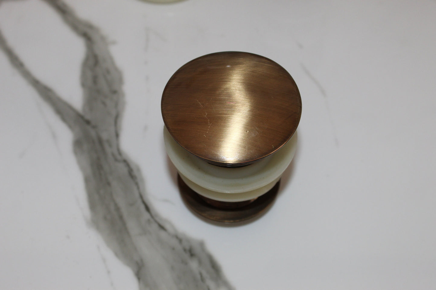 Unlacquered Brass Bathroom Sink Pop Up Drain.