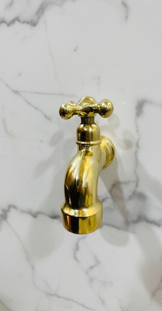 Unlacquered Solid Brass Classic Cross-Handle Wall Faucet.