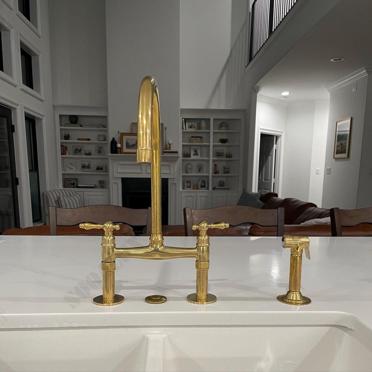 Unlacquered Brass Bridge Kitchen Sink Faucet with Sprayer.