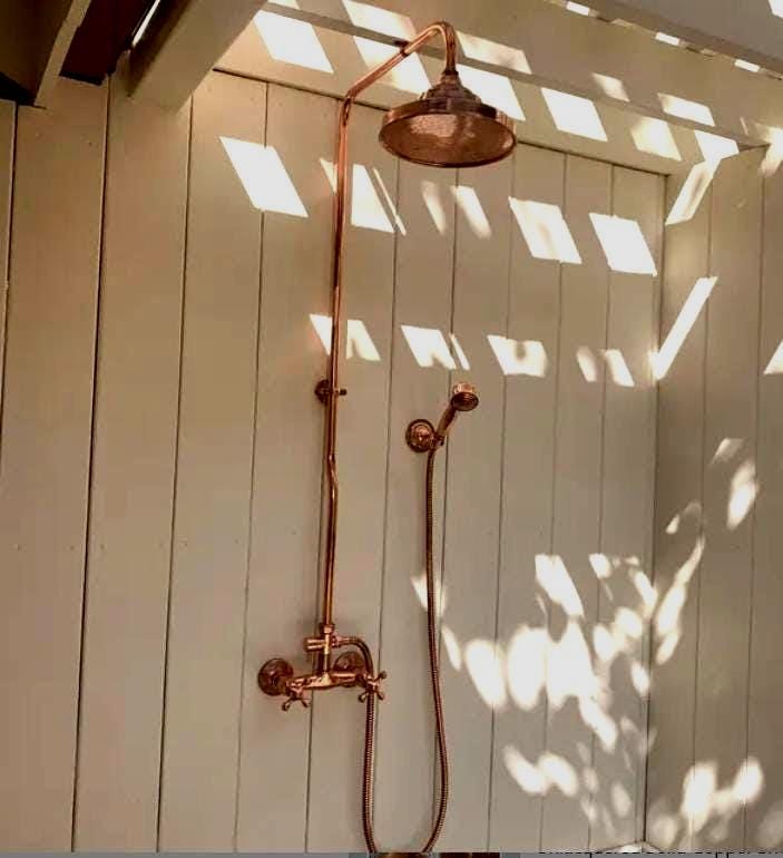 Unlacquered Copper Outdoor Shower with Copper Showerhead.