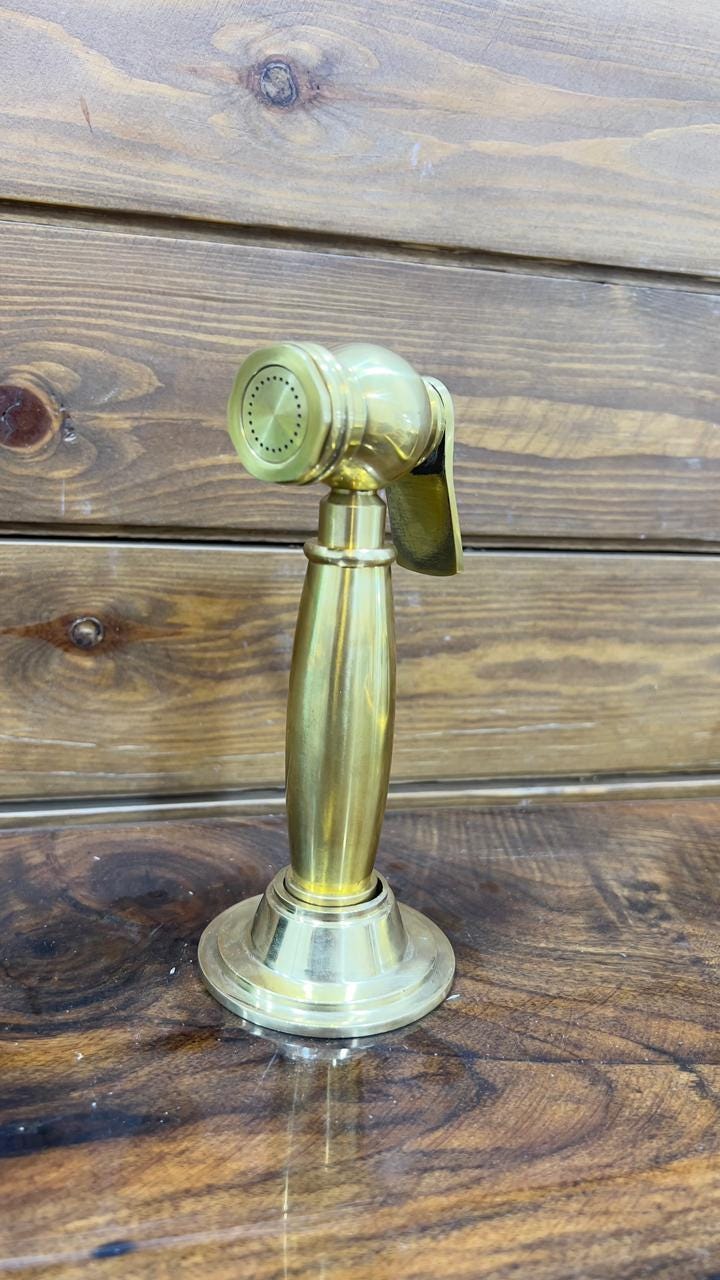 Unlacquered Solid Brass Sink side Sprayer faucet.